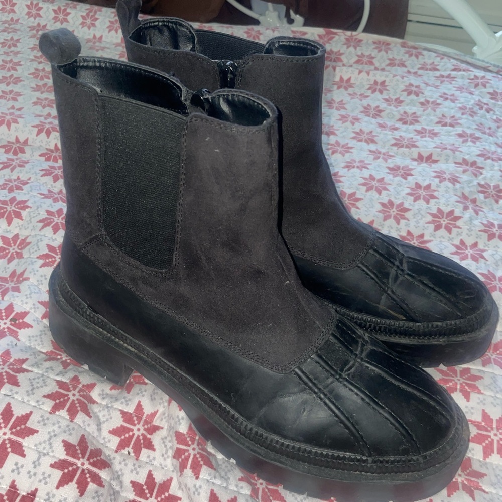 Black suede platform boots.